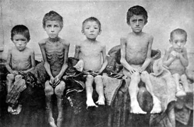 Photo of starving children, Ukraine, 1922 - [Public domain], via Wikimedia Commons