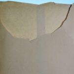 image of envelope with torn and missing identifying information.