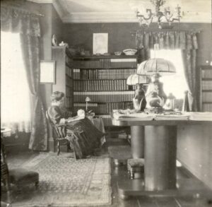 Pauline reading at home in the early 1900s