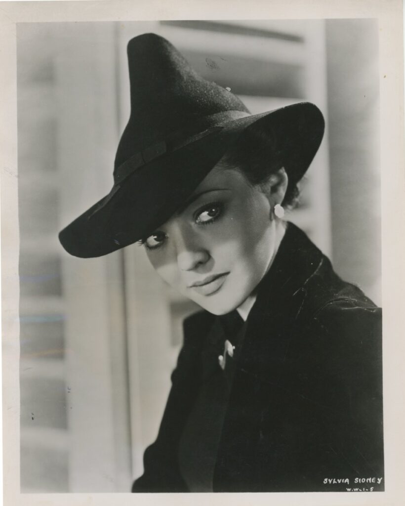 Photo of Sylvia Sidney wearing a Peter Pan Hat, 1935.