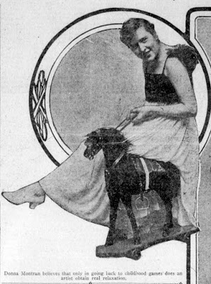 Newspaper Photo of Donna Montran sitting astride a wooden horse.
