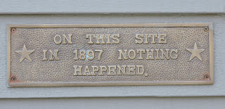 Sign "On this site in 1897 nothing happened" photo by Don Taylor