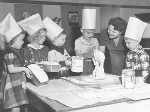 Photo of Kiindergarteners learning bread baking, Scheffer Elementary - c. 1950