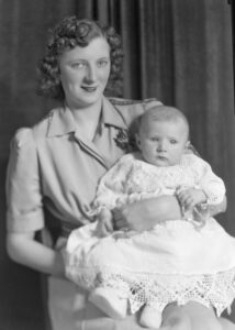 Photo of Virginia (Parks) Dennett holding a baby.