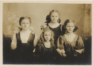 Photo of four young girls. 
