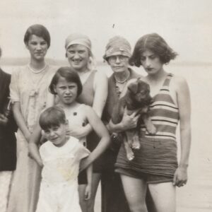Photo of six people, apparently at the beach.