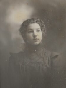 Photo of Flores Smart, c. 1899.