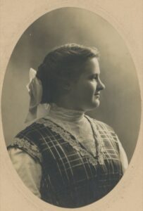 Photo of woman in profile.