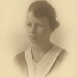 Photo of a young woman, signed "K".