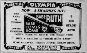 1927 newspaper ad showing what played at the Olympia Theatre including, the photoplay Babe Comes Home and the vaudeville show, Donna Darling Revue with Sammy Clark.