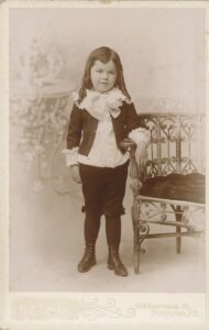 Cabinet card portrait of young Henry Hersey wearing a Fauntleroy-style suit, photographed at H. M. Smith studio, 478 Congress Street, Portland, Maine, circa 1893.