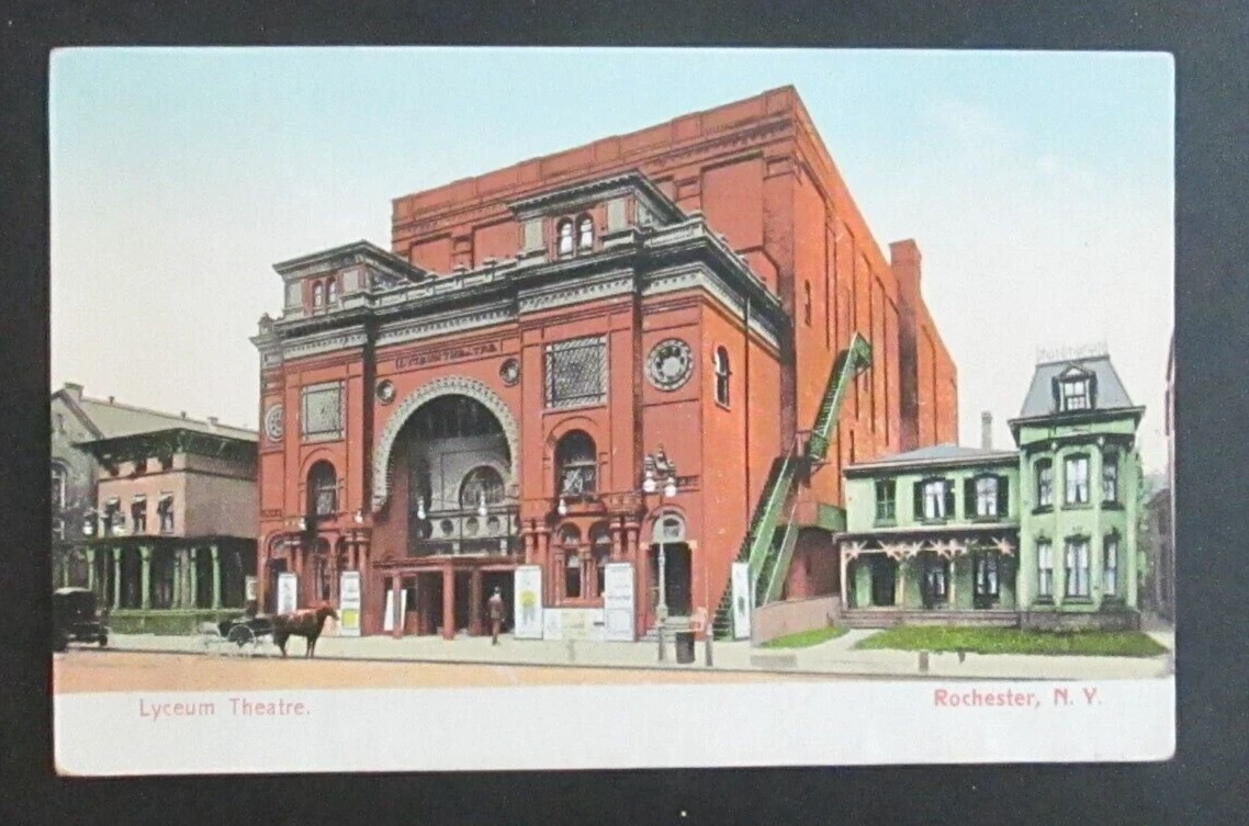 Vintage color postcard of the Lyceum Theatre, Rochester, New York, showing the red-brick facade with a horse-drawn carriage and early automobile parked outside